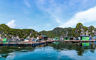 The floating fishing village and rock island in Lan Ha Bay, Vietnam
